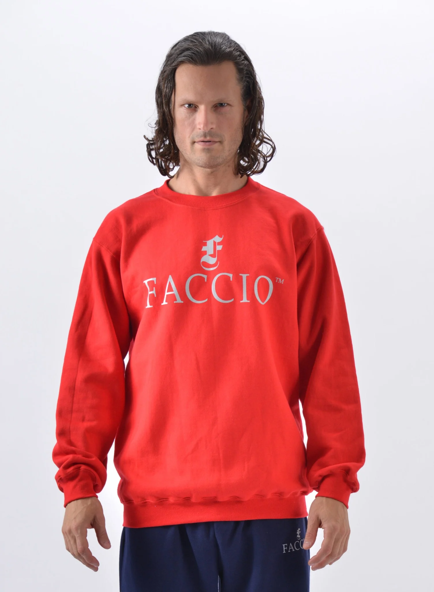 Faccio red sweatshirt worn by a model